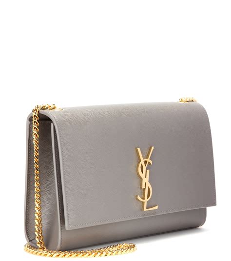 yves saint laurent small monogram tassel clutch grey|Saint Laurent clutches handbags.